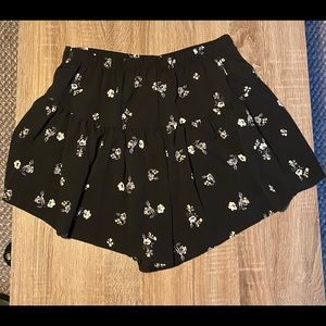 Francesca’s black shorts with flower details
